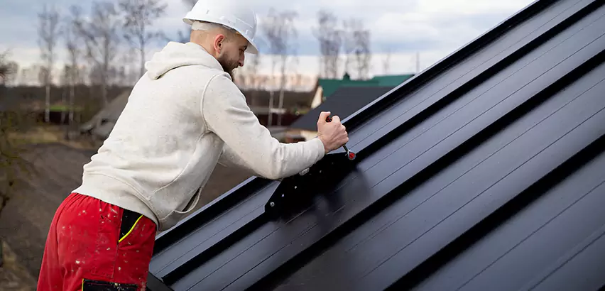 Tin Roof Ridge Cap Installation in Saint Charles